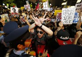 10,000 protest in Tokyo over security policy change