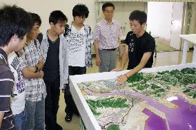 Tsunami-hit city's scale model used to show tidal waves