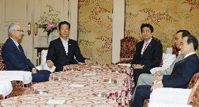 Japan's ruling bloc decides to extend Diet session to late Sept.
