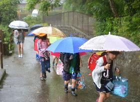 Children near Mt. Hakone attend school as usual