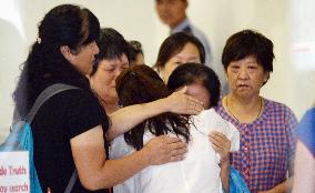 Malaysian Airlines MH370 relatives protest in Beijing