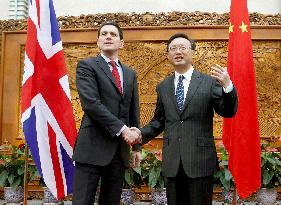 Britain, China, foreign ministers talk