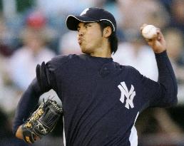 Igawa pitches 5 shutout innings, gets 1st spring win