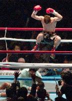 Japan's Hasegawa retains WBC title with TKO win