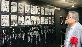 Author looks 'Golgo 13' exhibits in Osaka Pref.