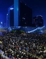 H.K. police arrest 20 people in anti-protest riot