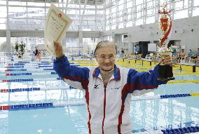 Japanese centenarian woman swims 1,500 meters in masters meet