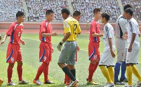 Young soccer players from N. Korea, Brazil greet one another in Pyongyang