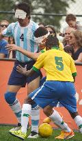 Blind football exhibition match marks 1 yr to go to Rio Paralympics