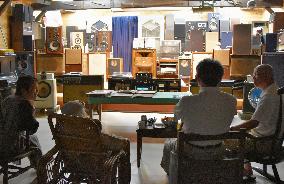 Visitors immerse themselves in vinyl record sound