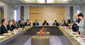 China mission head speaks during visit to Kagoshima governor