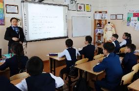 Japanese teacher speaks to students in Russia's Tuva Republic