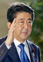 Abe, opposition leaders clash over Japan security bills