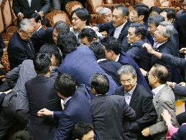 Controversial Japan security bills clear upper house panel
