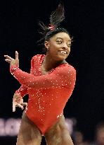 Biles becomes 1st woman to win 3 consecutive world titles