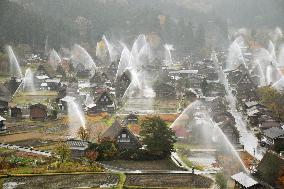 Water-discharge drill at Shirakawa-go in central Japan