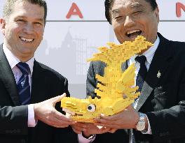 Nagoya mayor gets Lego-brick dragon at start of Legoland project