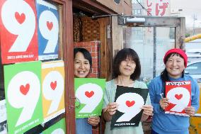 Citizens show their "love" for Article 9 of Constitution with posters
