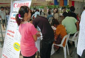 Job interviews for people affected by flooding in Thailand