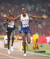 Briton Farah wins 10,000m at world championships in Beijing