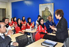 Afghan women's soccer team members listen to A-bomb survivor