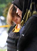 Malaysia charges 2 women with murder in Kim's death