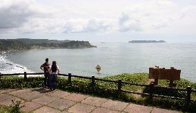 Cape looking out Pacific site of WWII ship sunk by U.S.