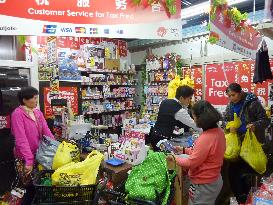 Foreign tourists swarm Tokyo discount store