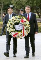 ICRD chief Maurer offers flowers at Hiroshima peace park