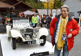 Actor joins classic car festival with his Jaguar in western Japan