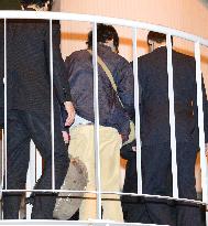 Japanese held for trying to join Islamic State returns to Japan