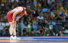 Olympic scenes: Japan's Yoshida bows in tears