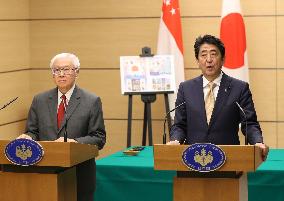 Japan, Singapore leaders affirm unity on bringing trade deal into force