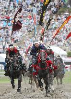 Armored warriors compete in horse race