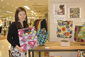 Japanese entrepreneur selling bags handmade by Ugandan women
