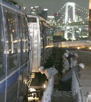 Tokyo's unmanned transit system suspended due to train car troub