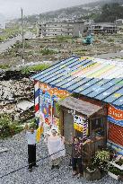 Colorful temporary barber shop in tsunami-hit Ofunato