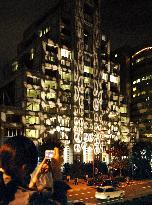 Peace symbols lit up at United Nations University in Tokyo