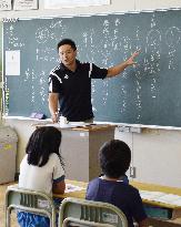 Ex-Japan rugby captain teaches school kids in north Japan on outreach program