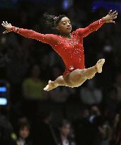 Biles becomes 1st woman to win 3 consecutive world titles