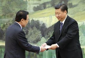 China willing to mend ties with S. Korea, Xi tells special envoy