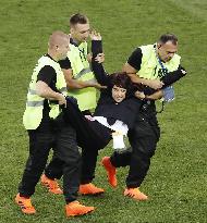 Football: Pitch-invasion protest at World Cup final