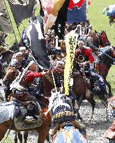 Armored warriors compete in horse race