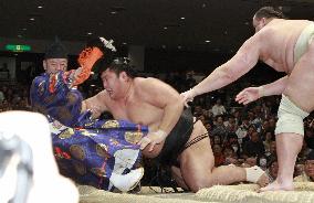 CORRECTED Sumo referee sent to hospital after being hit by wrestl