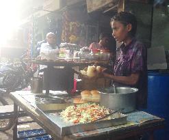 Indian boy works away from home in Mumbai