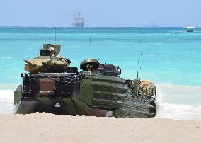 Amphibious vehicle lands on beach during U.S. military drill in Hawaii