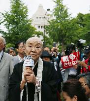 Novelist-turned-nun Setouchi against national security bills