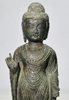 Stolen Buddhist statue arrives from South Korea