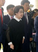 Former S. Korean first lady departs for N. Korea