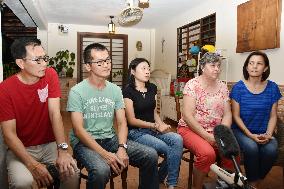 Families of missing MH370's crew ask for continuous search